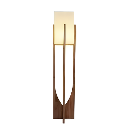 Floor lamp with wooden base and white shade on a white background
