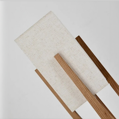 Wooden frame with woven material on a white background